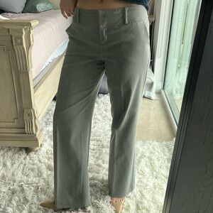 Theory size 4 wide legged grey work pants with belt loops and pockets.